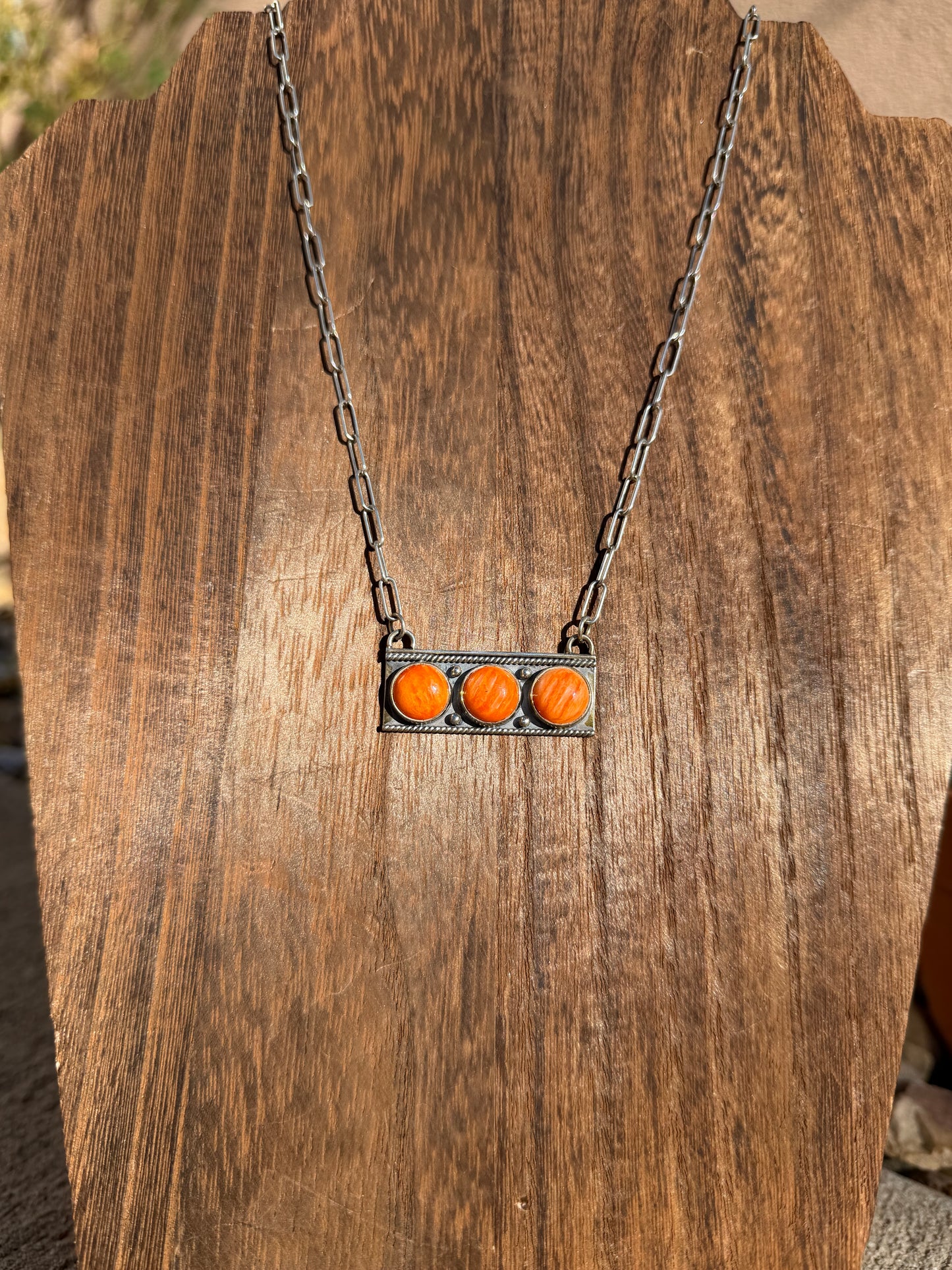 3 stone Orange spiny bar 22"