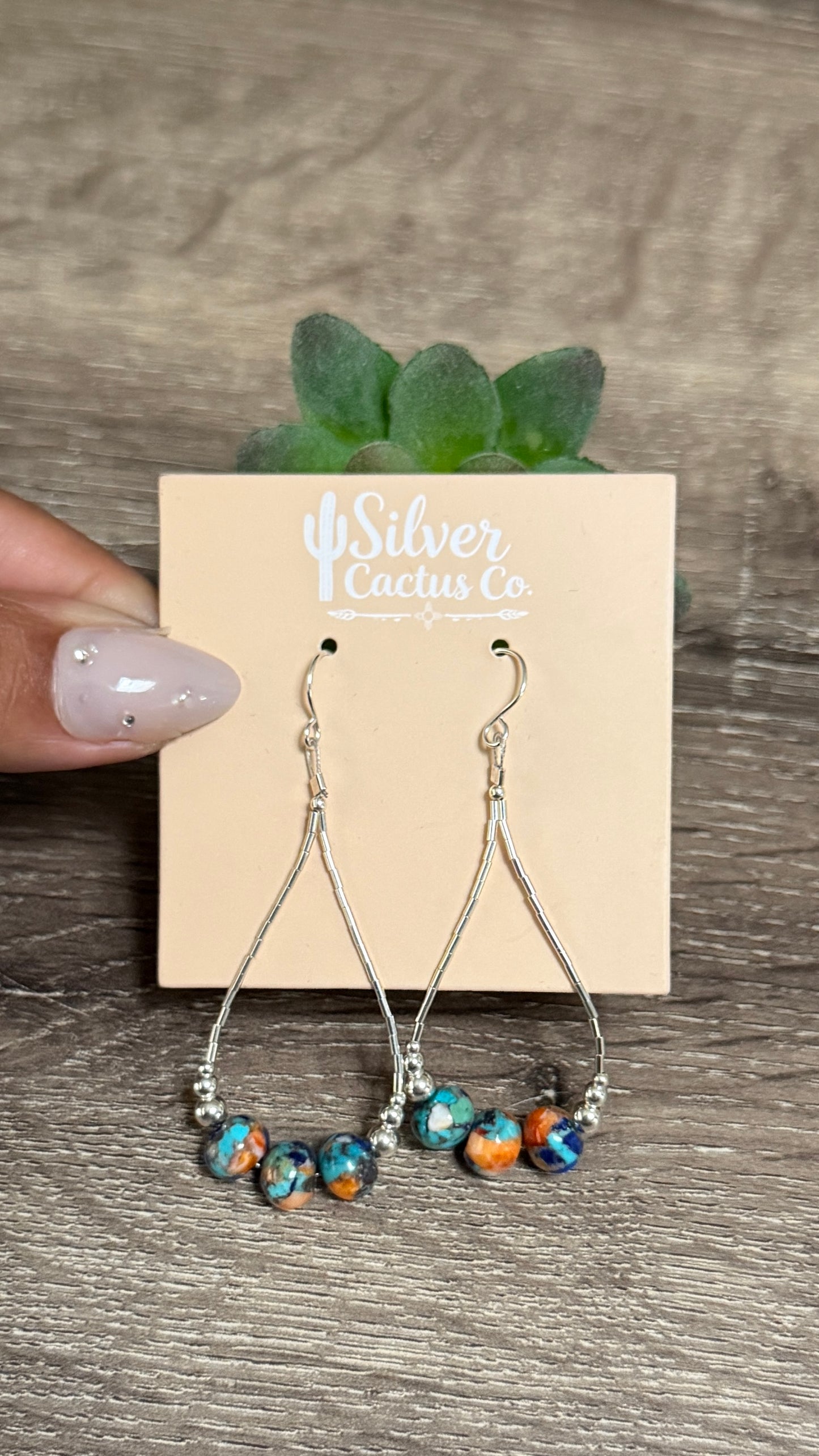 Liquid silver loops with compressed beads