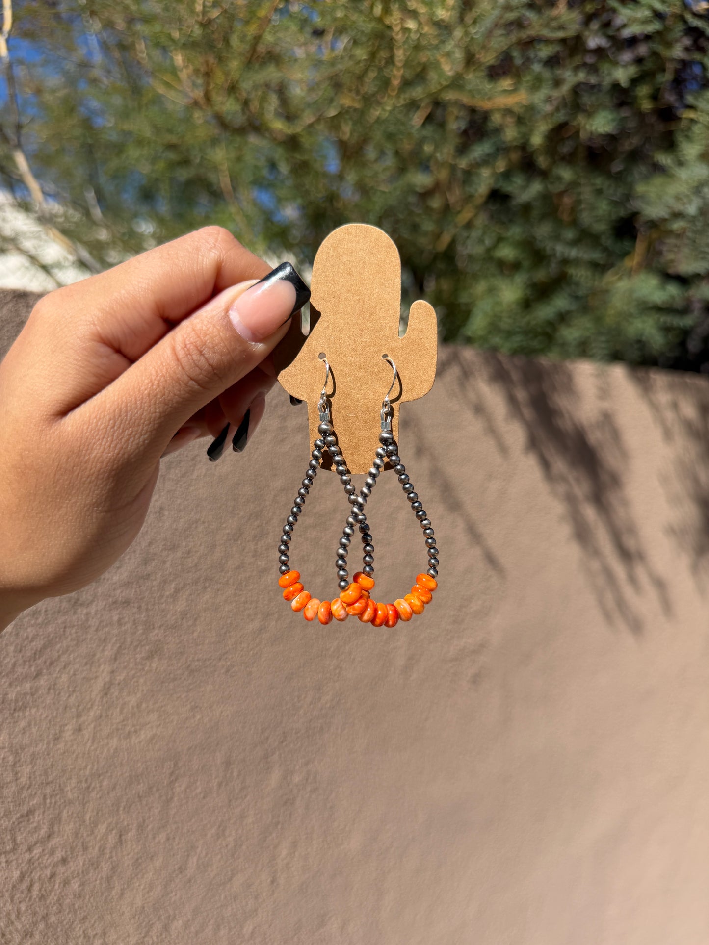 Silver pearl & orange spiny rondelle loop earrings