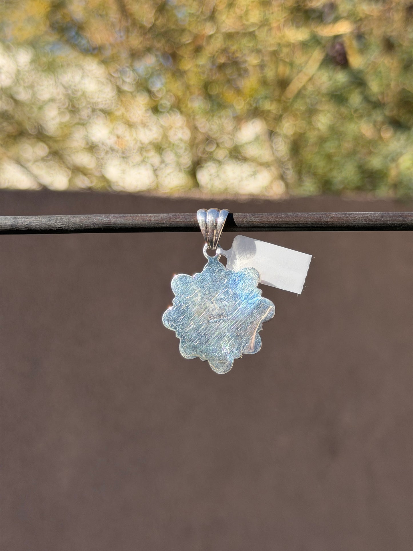 Orange spiny heart pendant