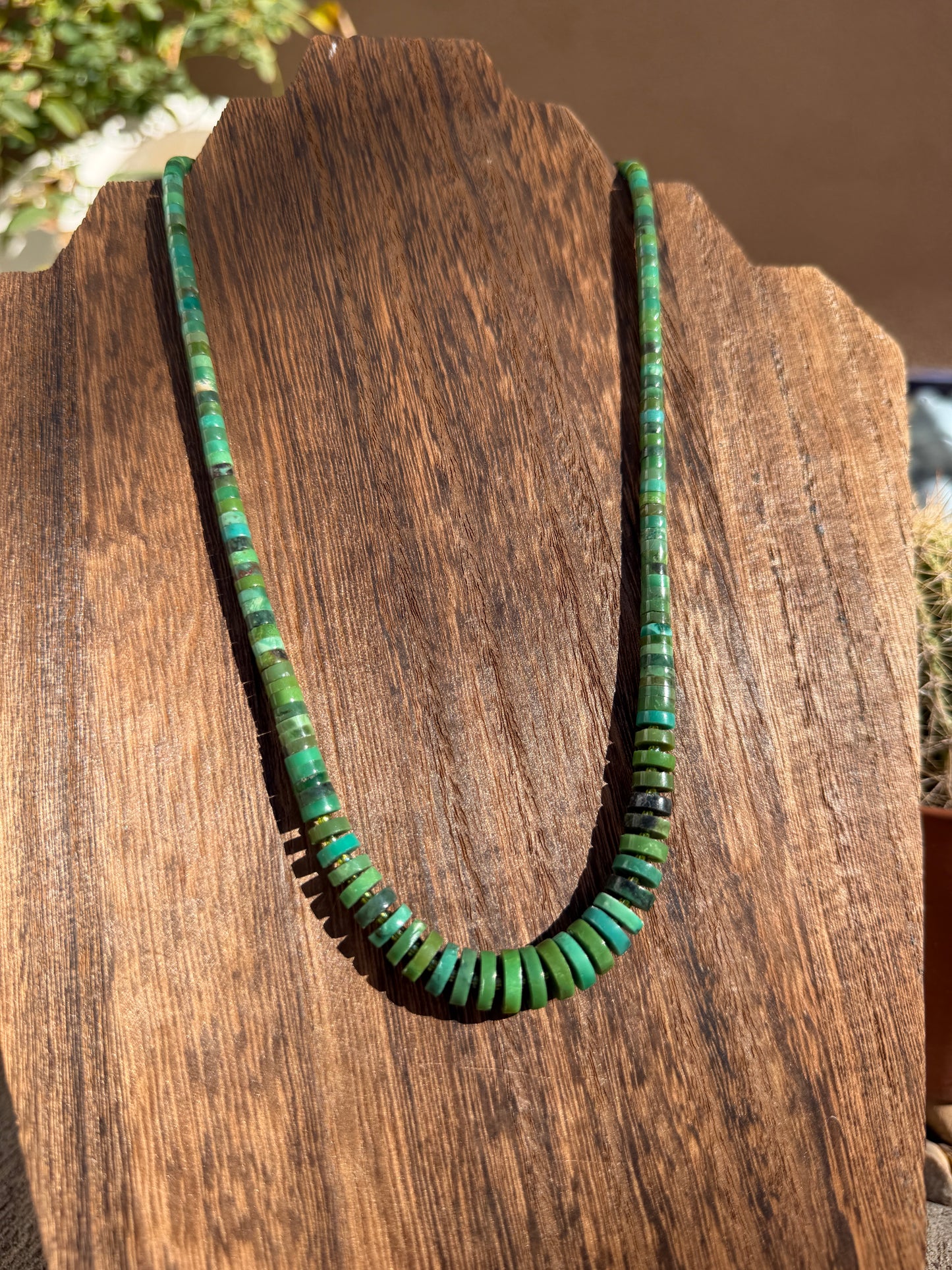 Green TQ graduated necklace