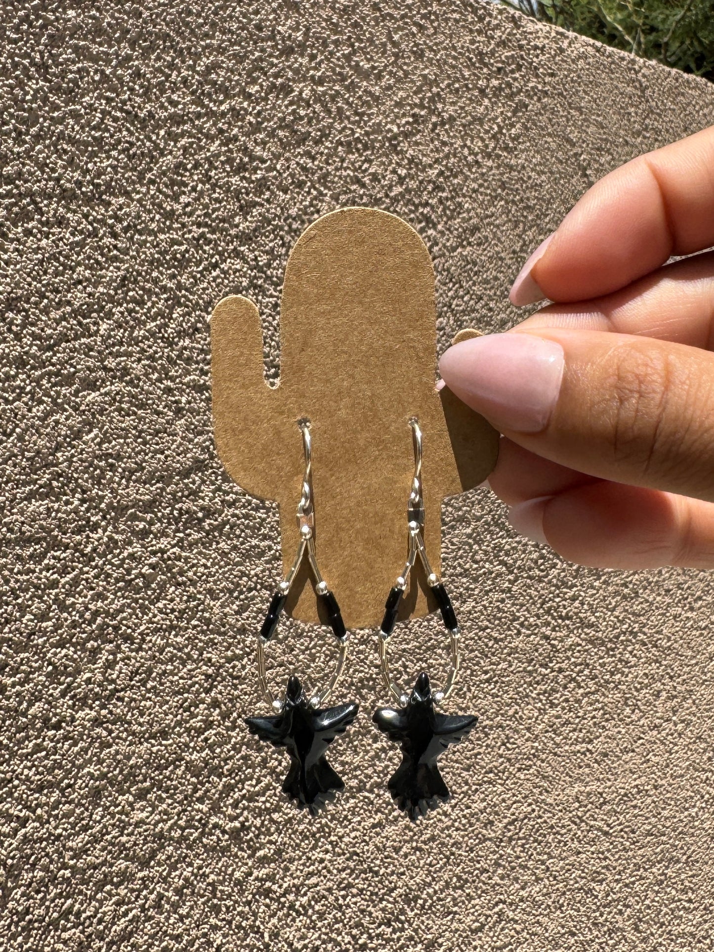 Liquid silver loop earrings with Black Onyx bird
