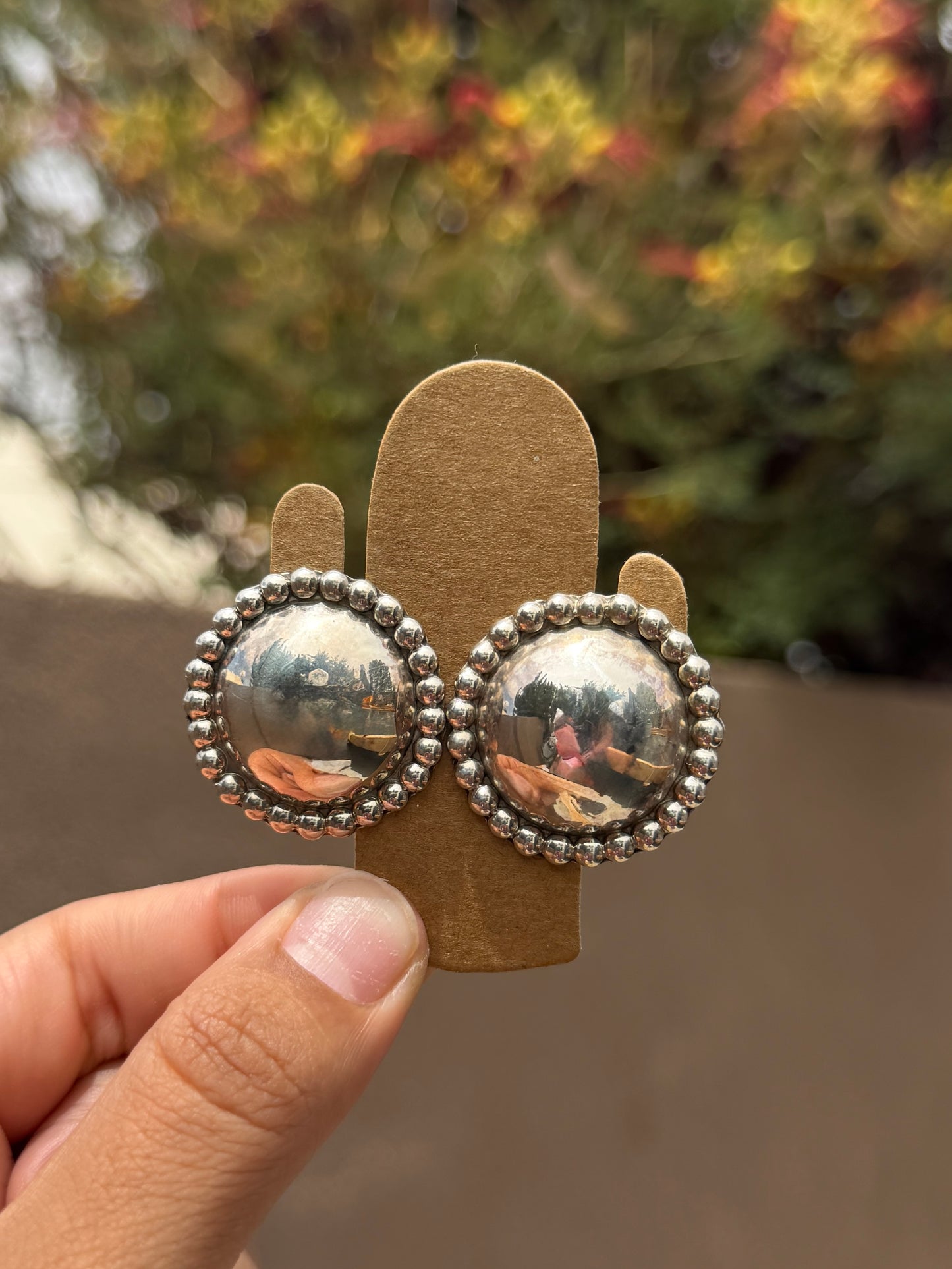 Lorraine Chee silver concho studs