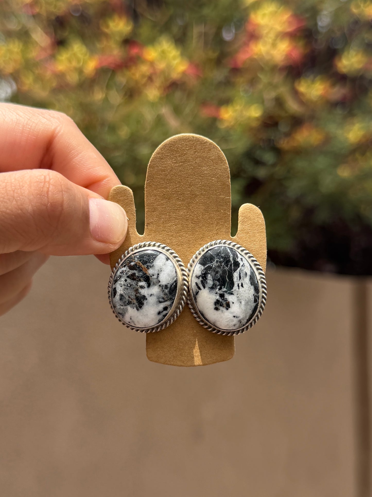 T Smith White buffalo round earrings