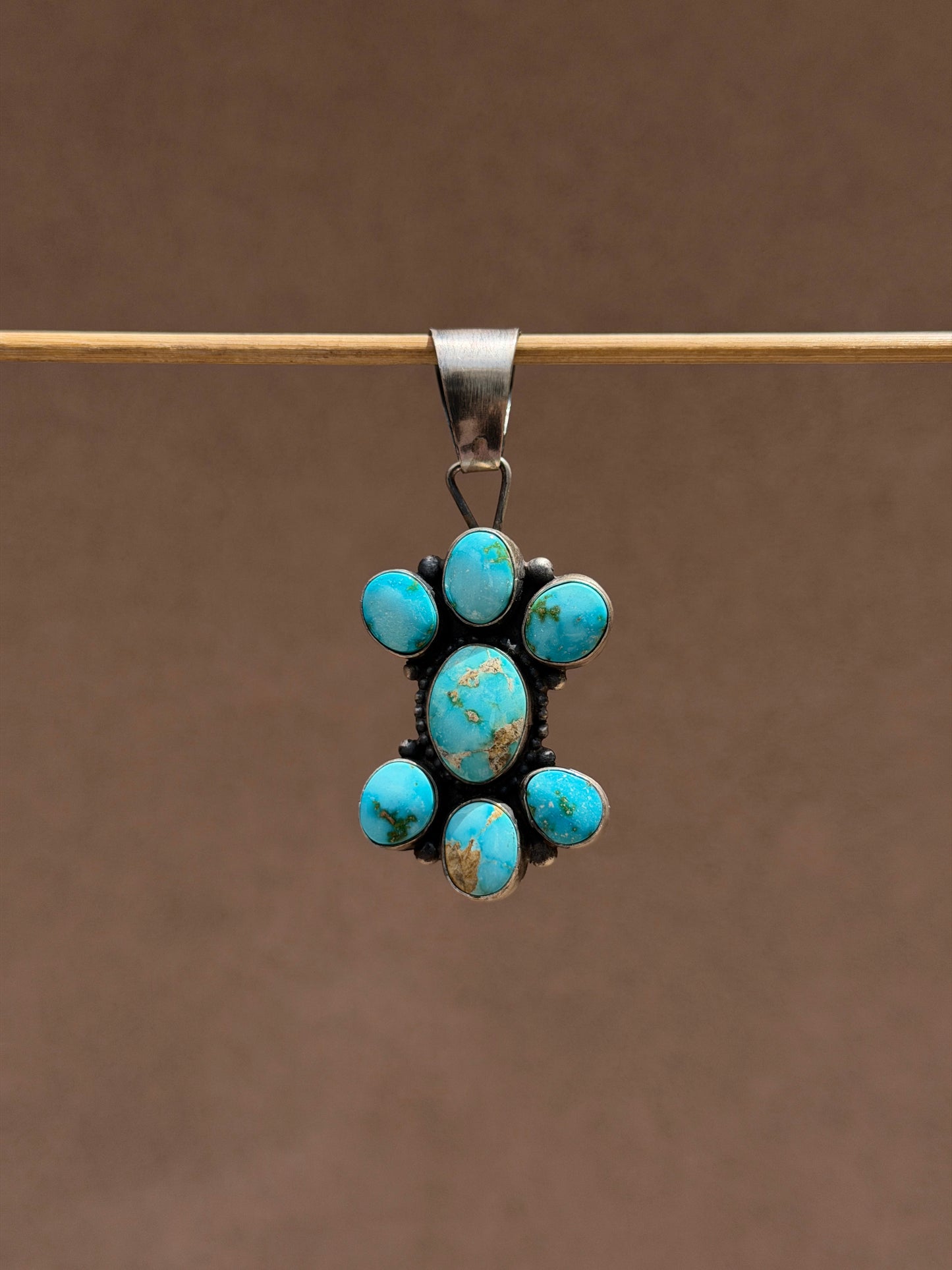 Sheila Sonoran Gold TQ pendant