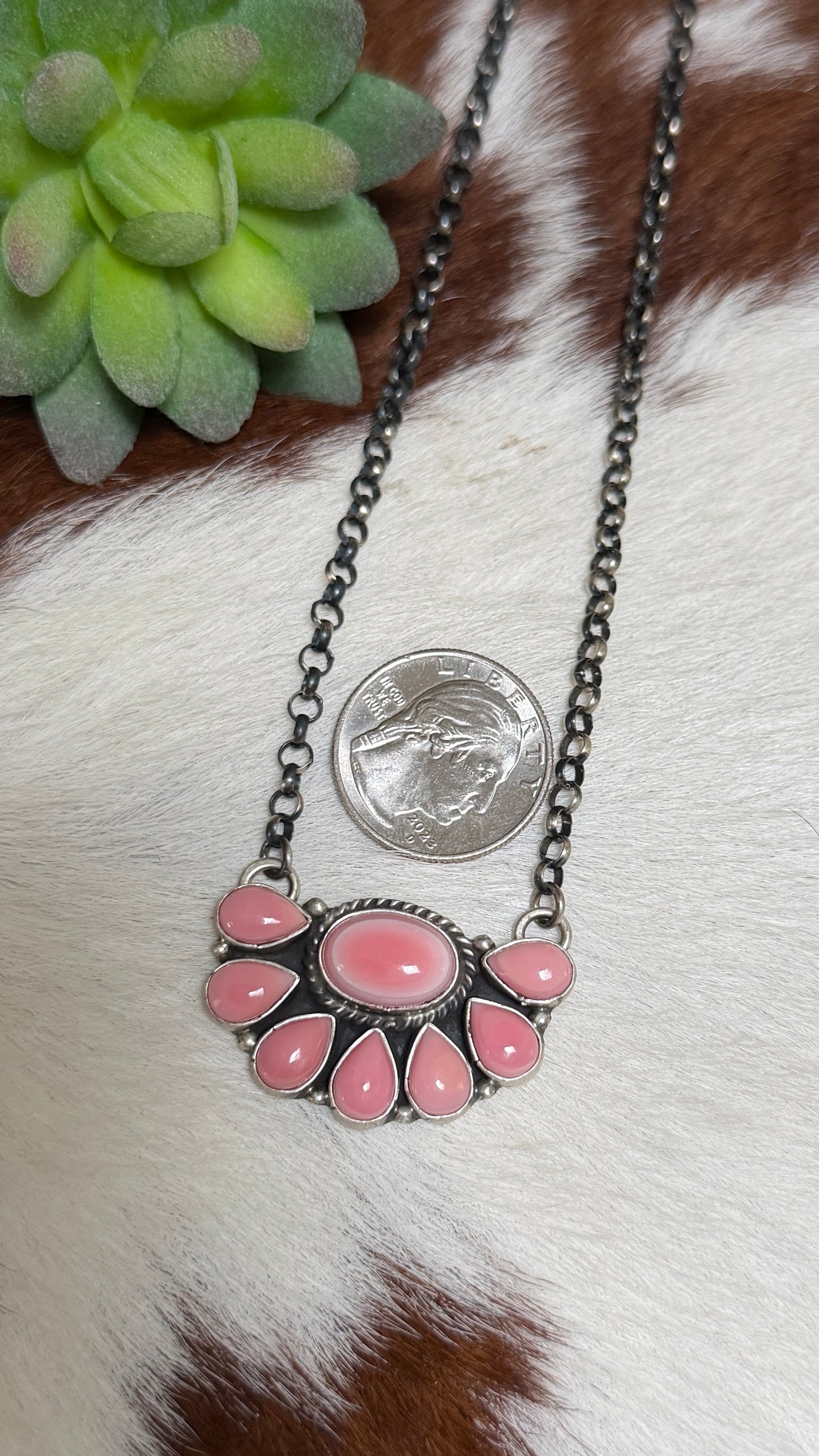 Marcella James Pink conch half cluster