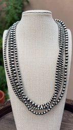 Multi strand pearl necklace