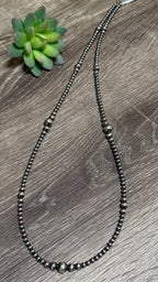 Graduated Pearl necklace 28"