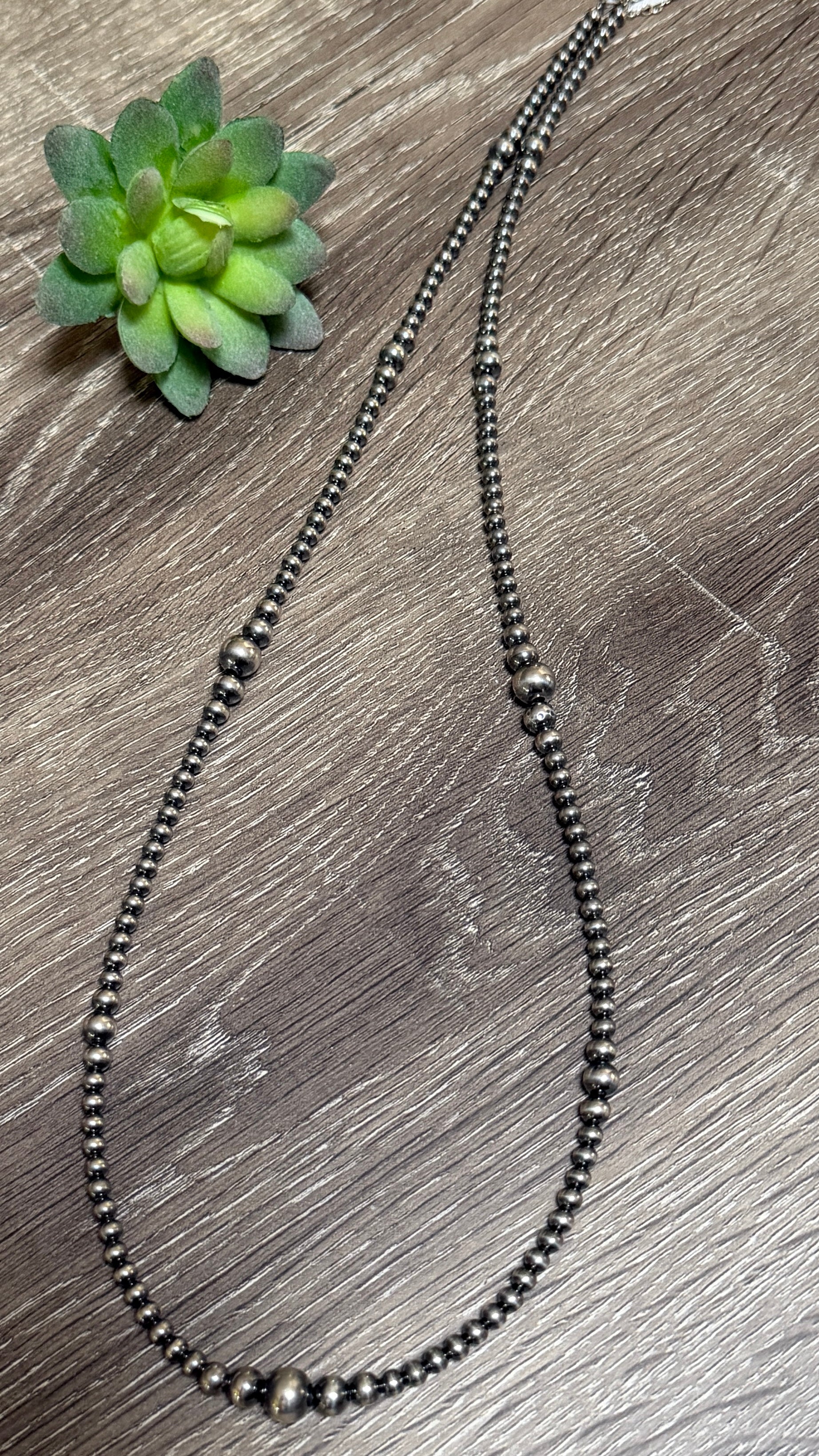 Graduated Pearl necklace 28"