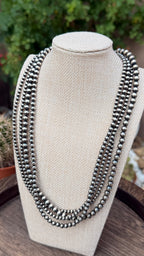 Multi strand pearl necklace