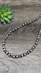 Chimney Butte saucer & pearl necklace 22.5"