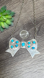 Silver bow & Turquoise necklaces