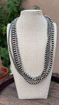 Multi strand pearl necklace