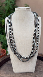 Multi strand pearl necklace