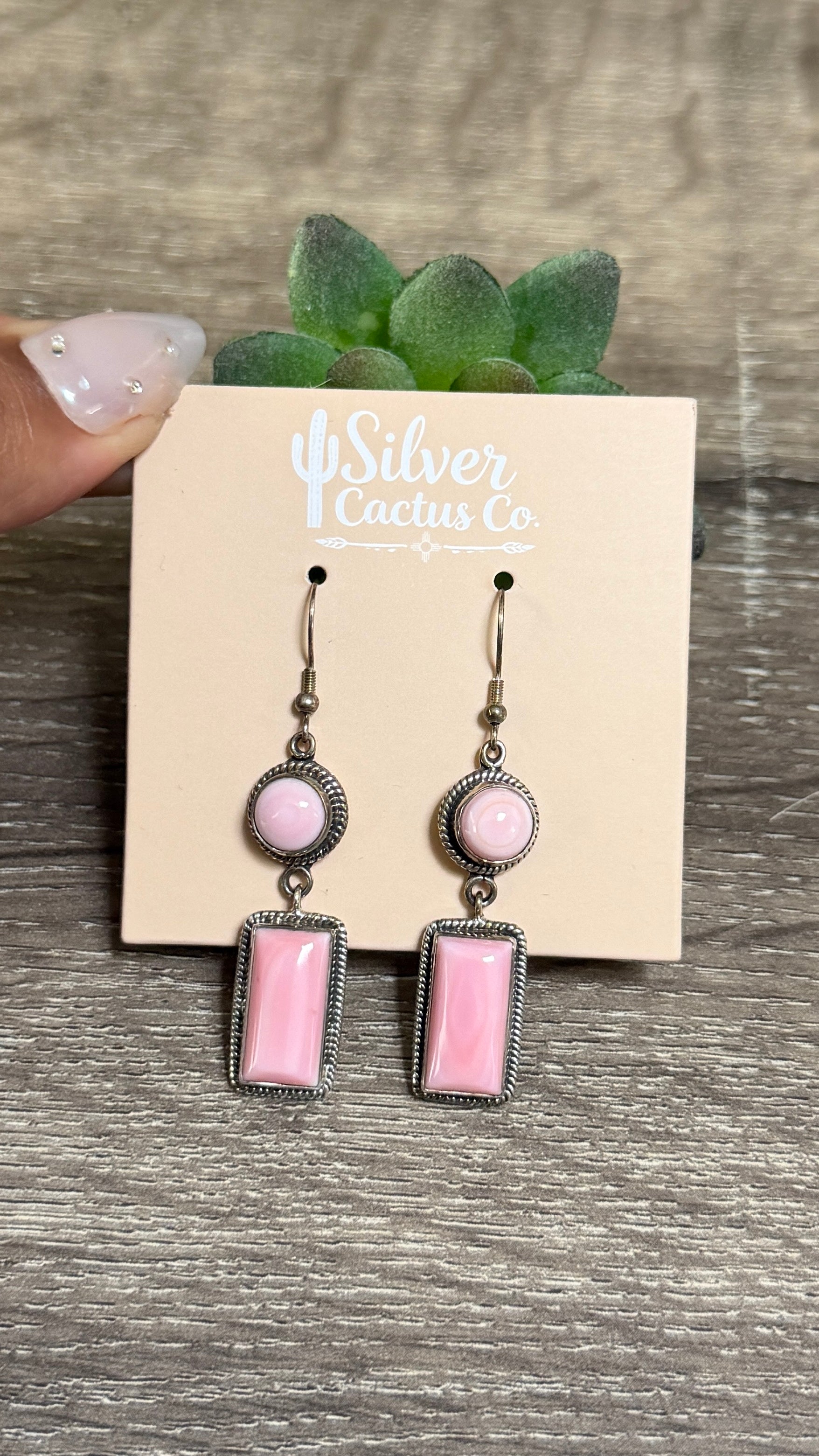 Pink conch dangles