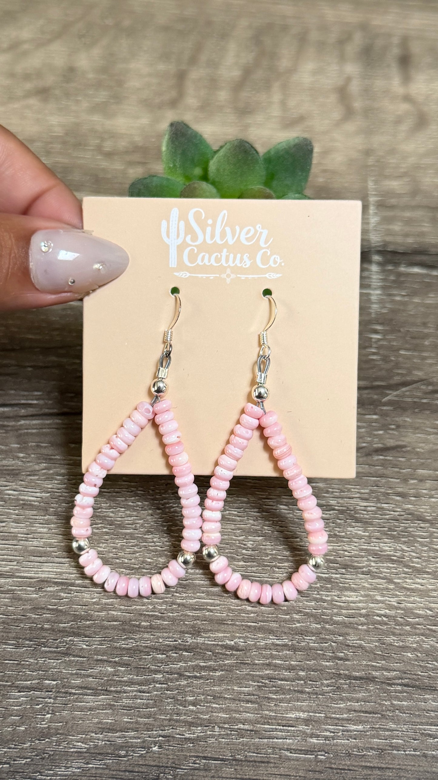 Pink conch loop earrings
