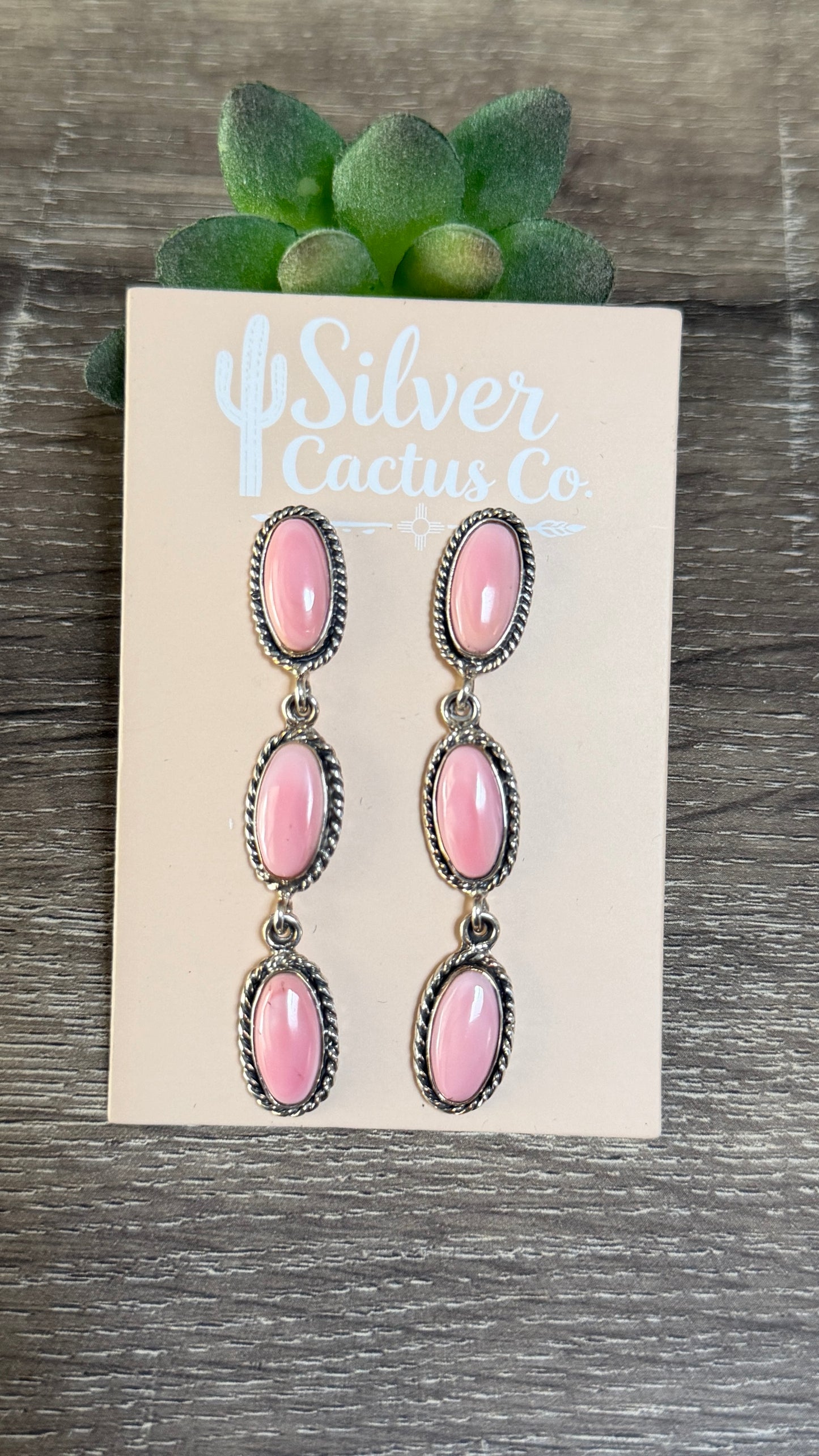 Pink conch statement dangles