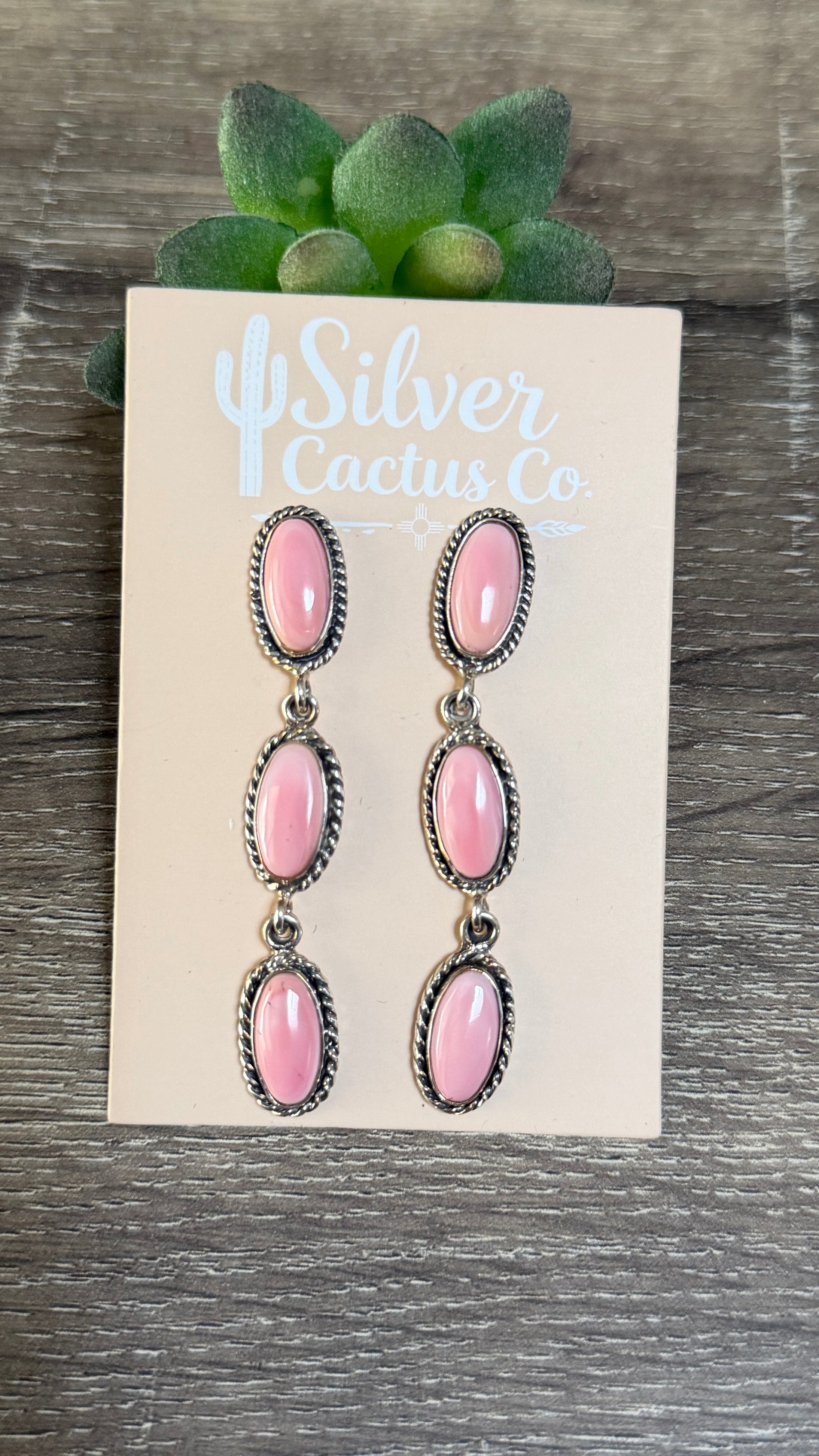 Pink conch statement dangles