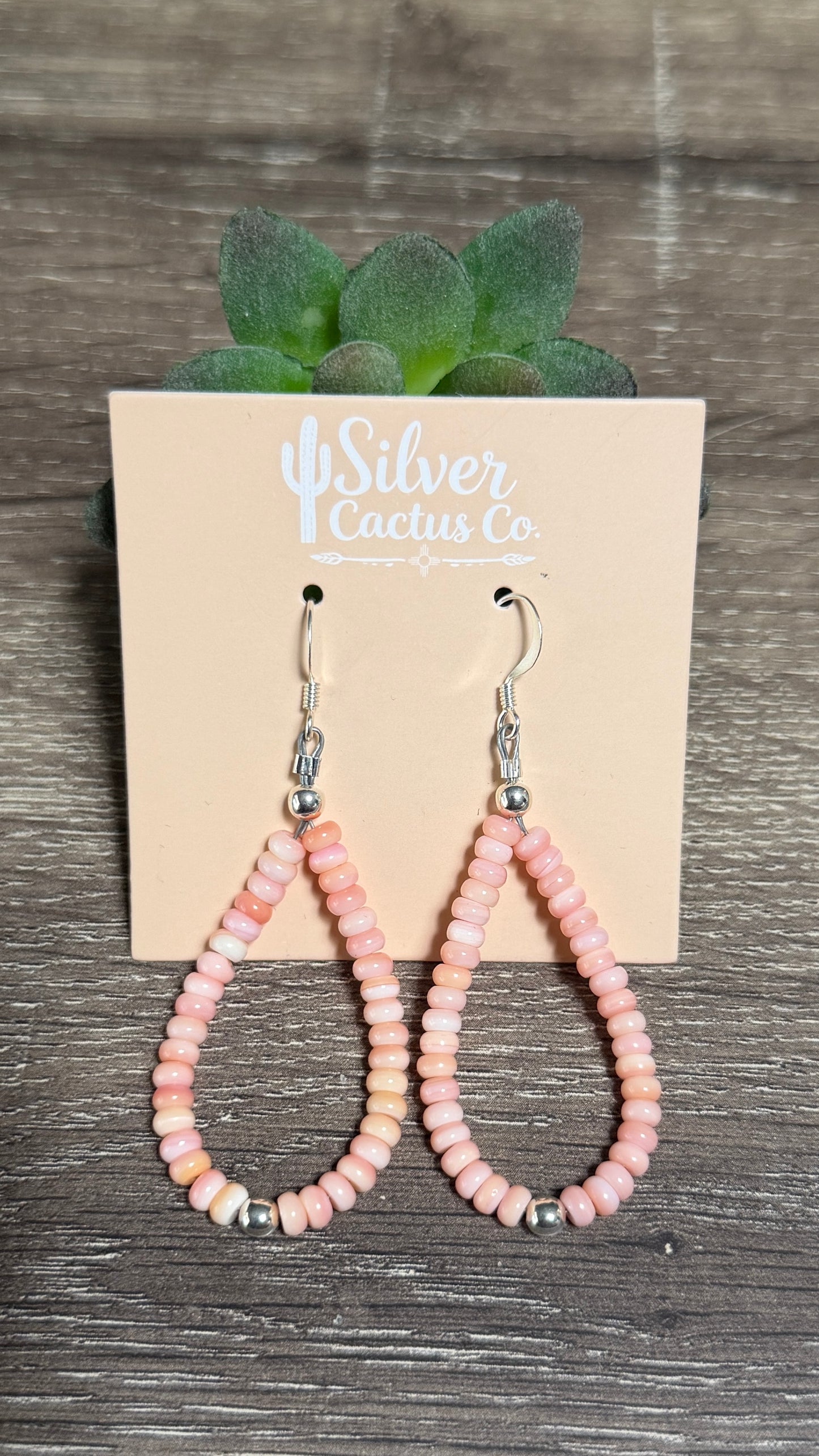 Pink conch rondelle loops