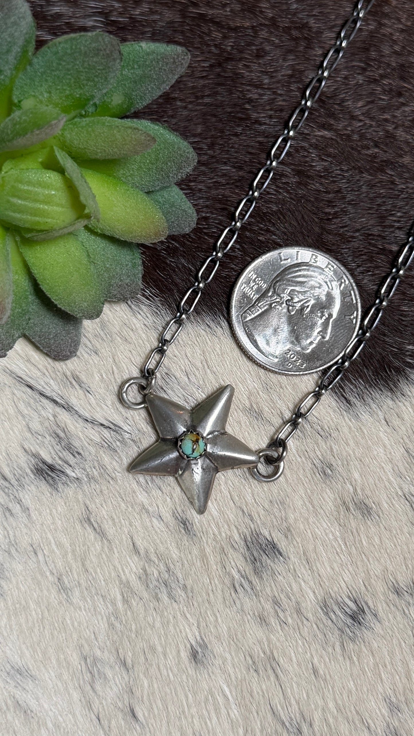 C. Shorty TQ star necklace