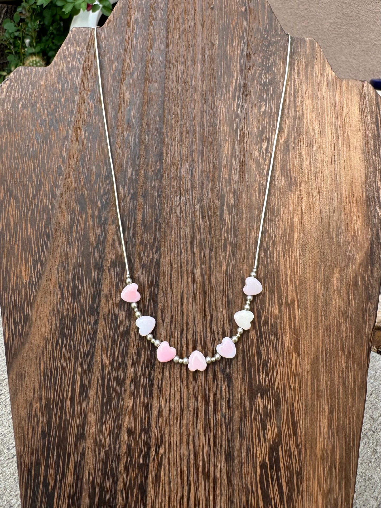 Liquid silver pink conch heart necklace