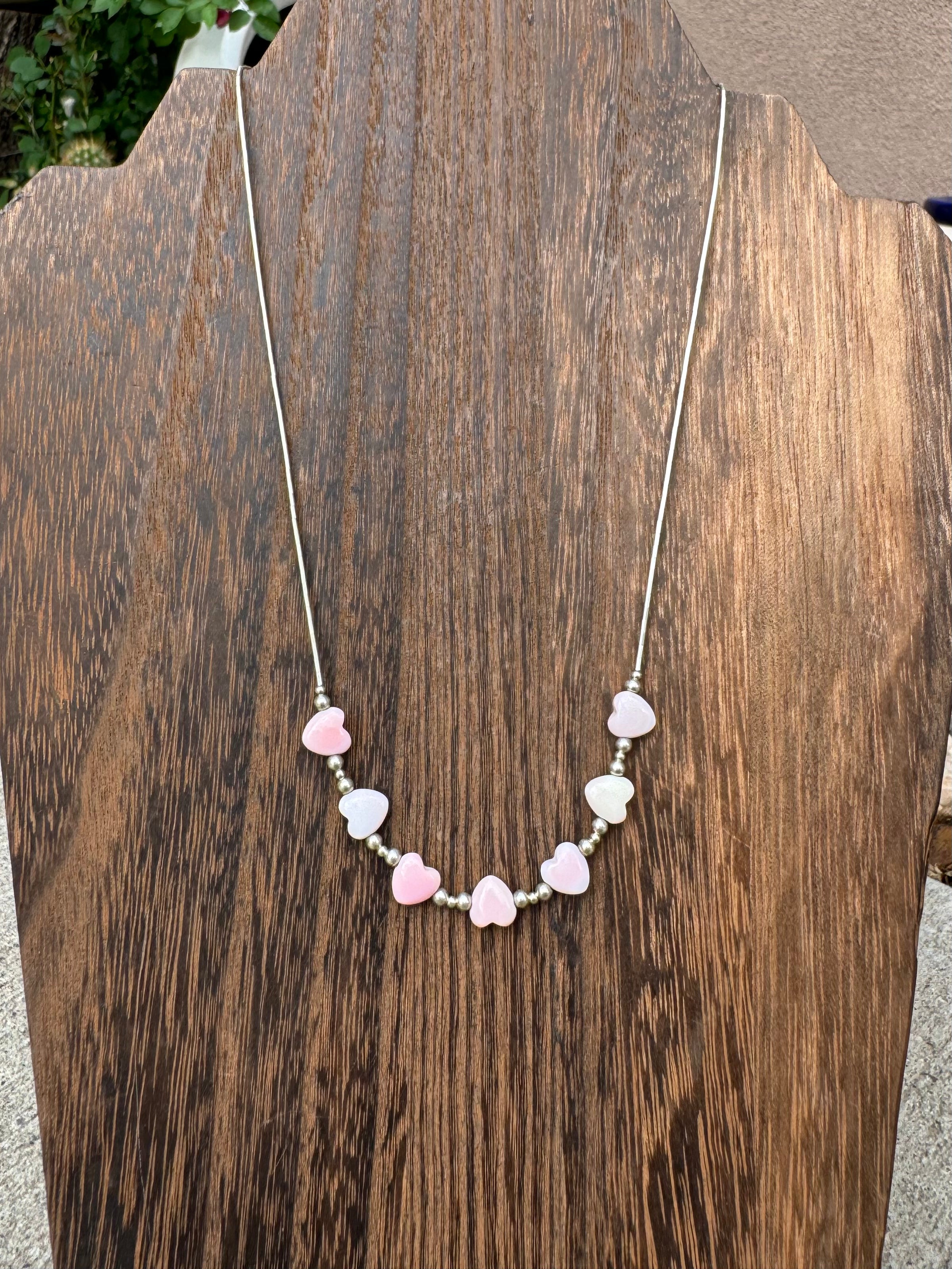 Liquid silver pink conch heart necklace