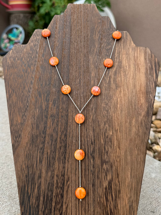 Orange spiny lariat