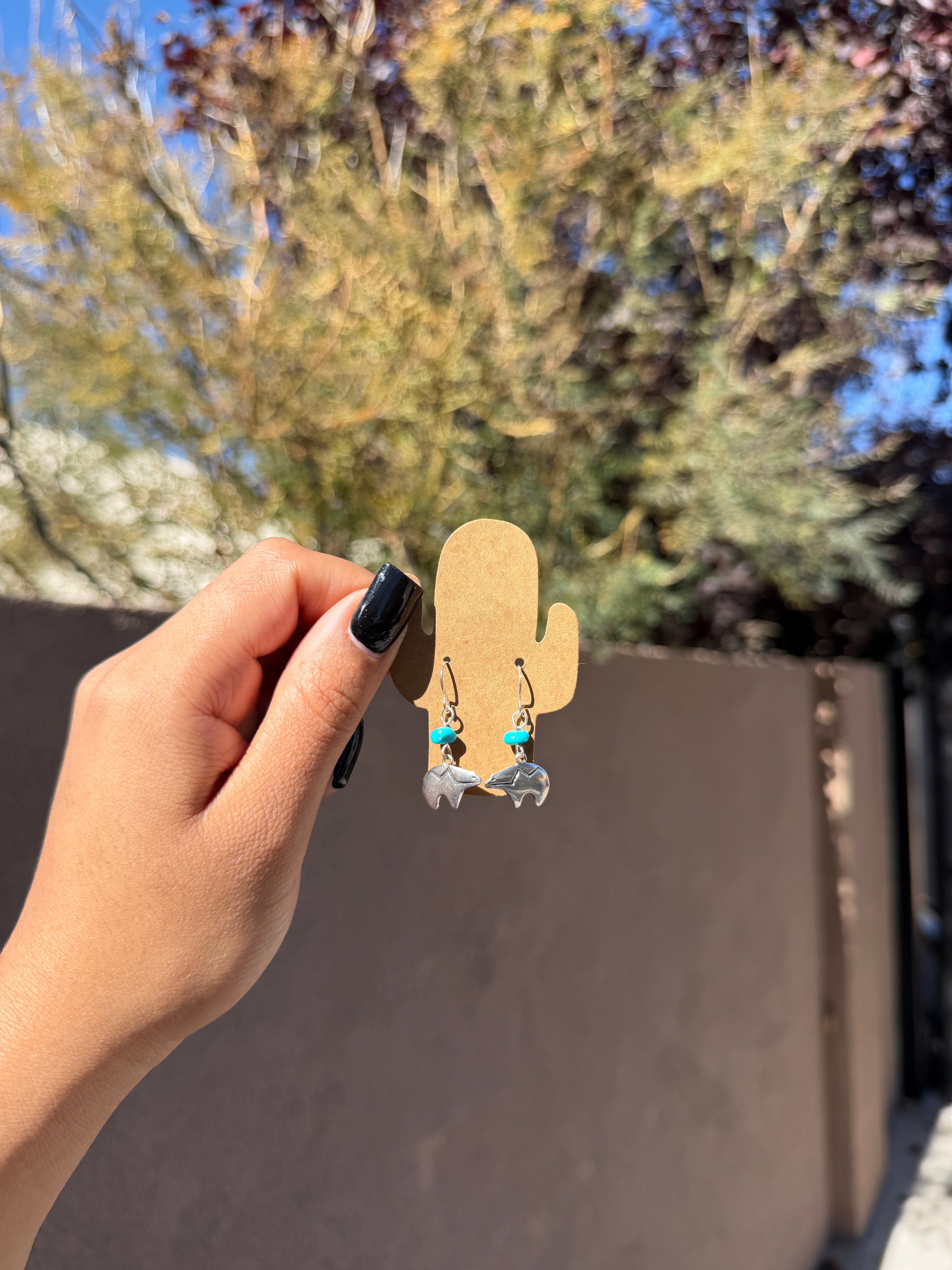 Bear dangles