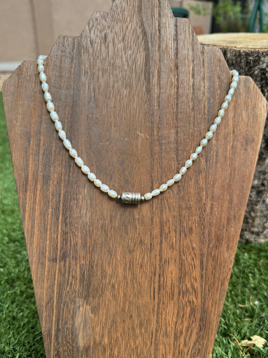 Freshwater pearls with silver barrel