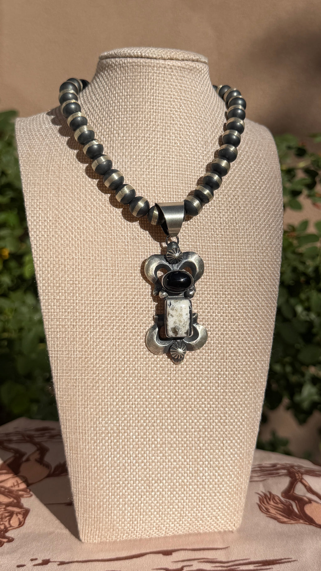 Chimney Butte White buffalo & Onyx pendant