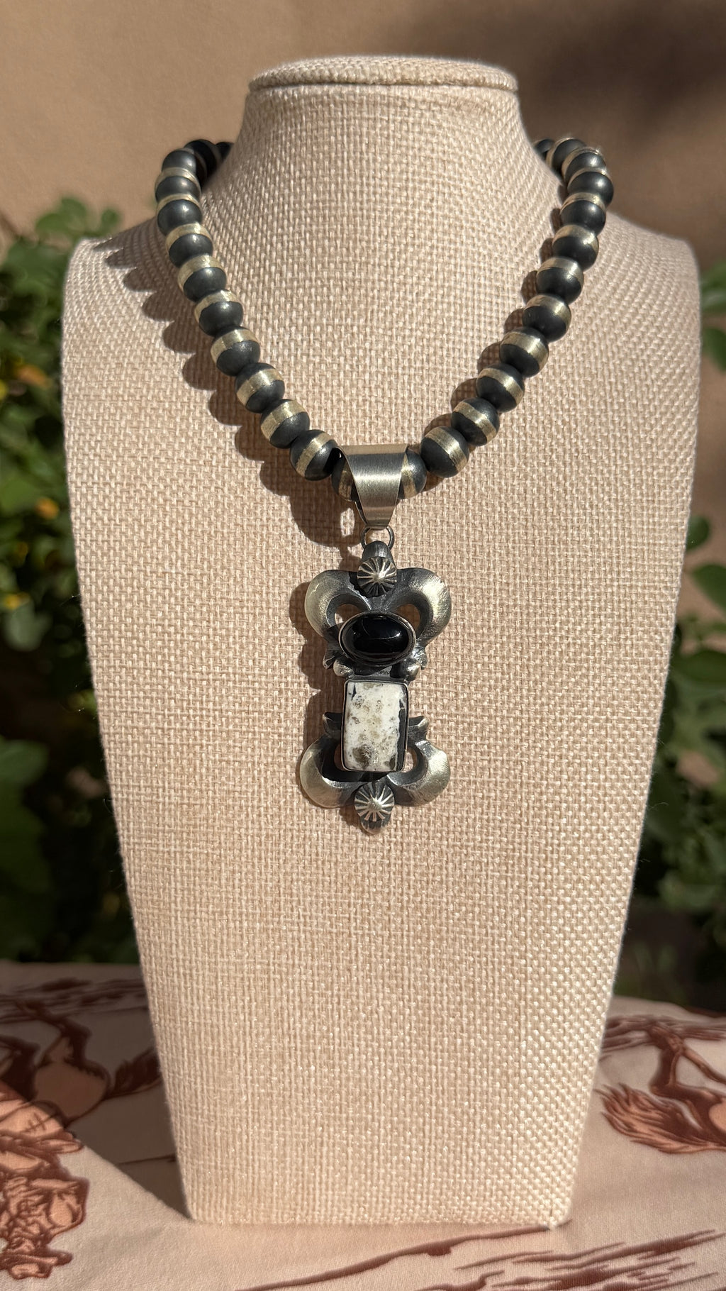 Chimney Butte White buffalo & Onyx pendant
