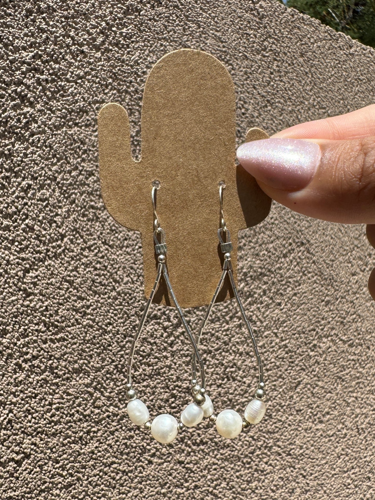 Liquid silver loop earrings with fresh water pearls