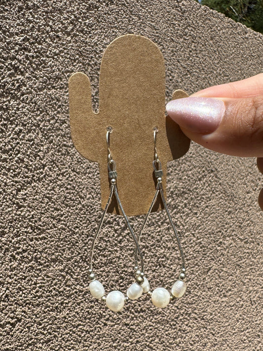Liquid silver loop earrings with fresh water pearls