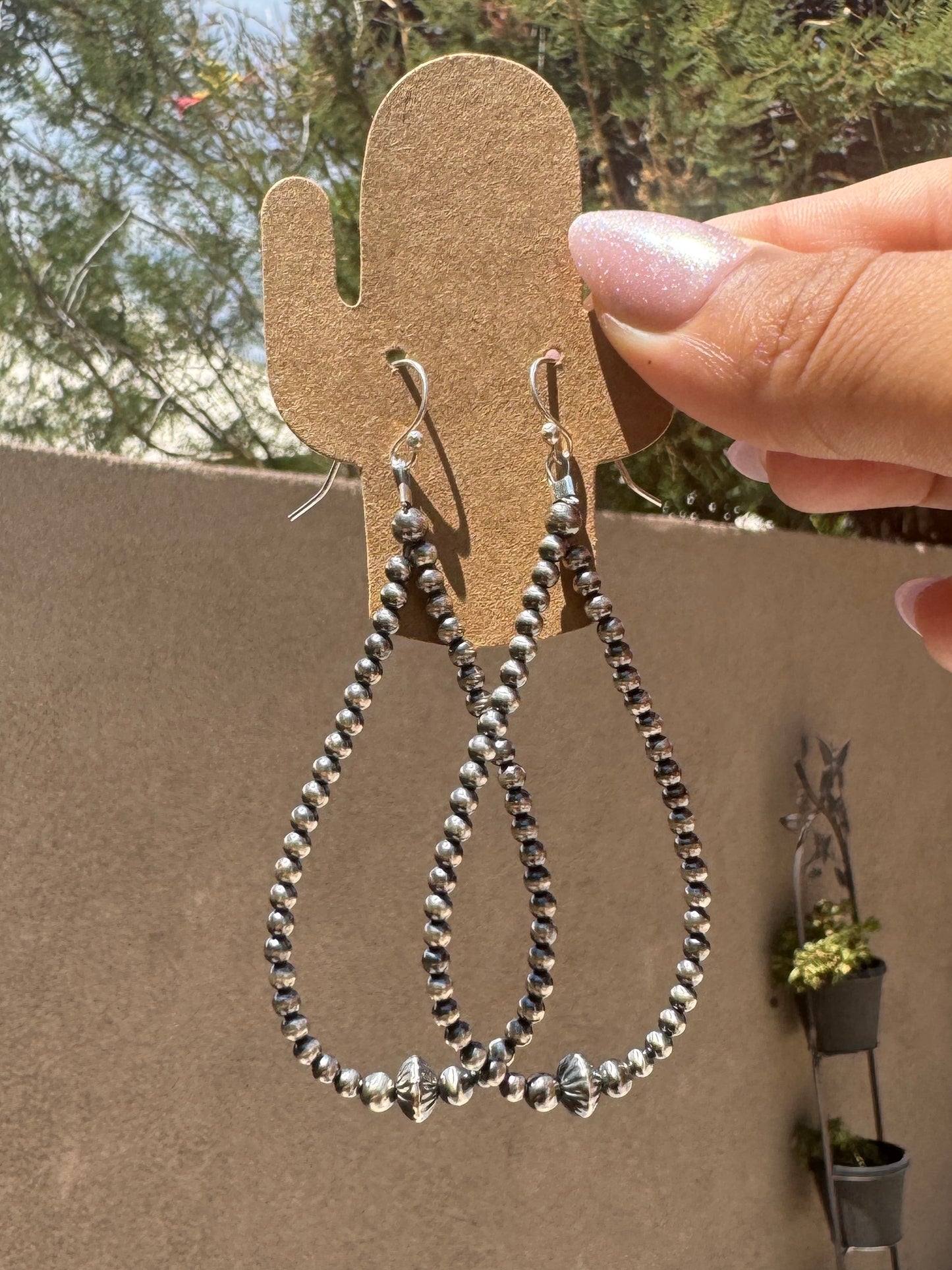 Silver pearl & saucer loop earrings