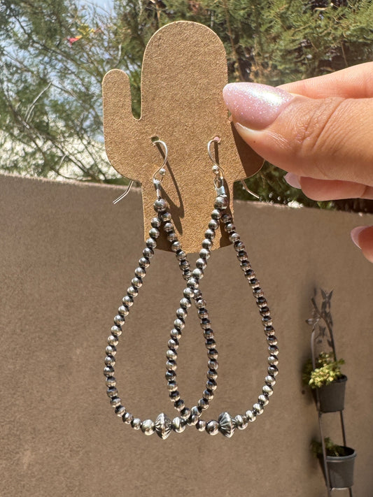 Silver pearl & saucer loop earrings