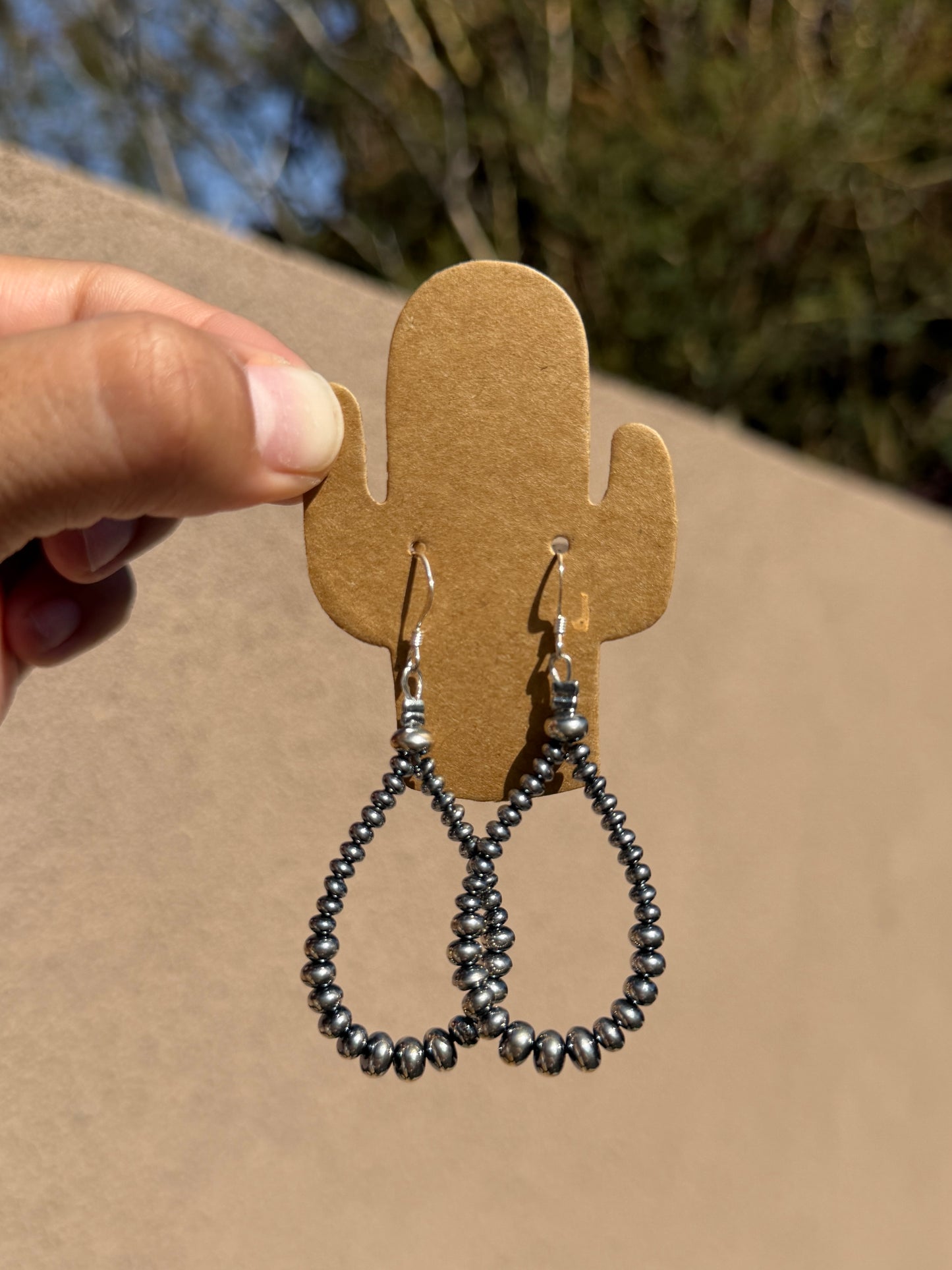 Silver rondelle loop earrings