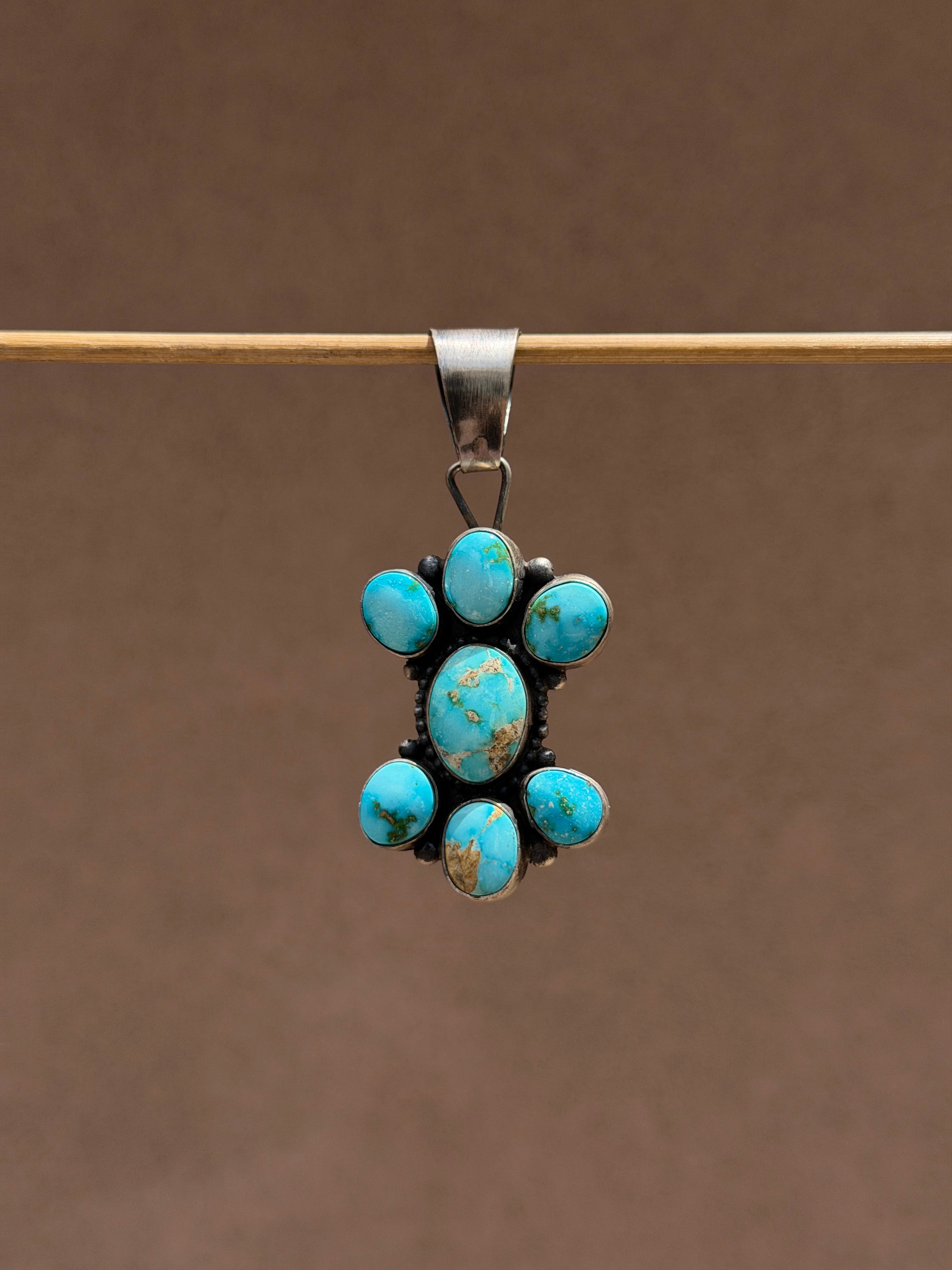 Sheila Sonoran Gold TQ pendant