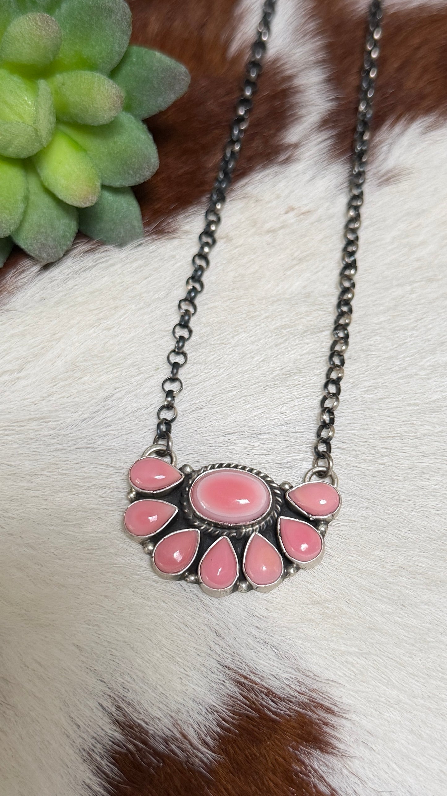 Marcella James Pink conch half cluster